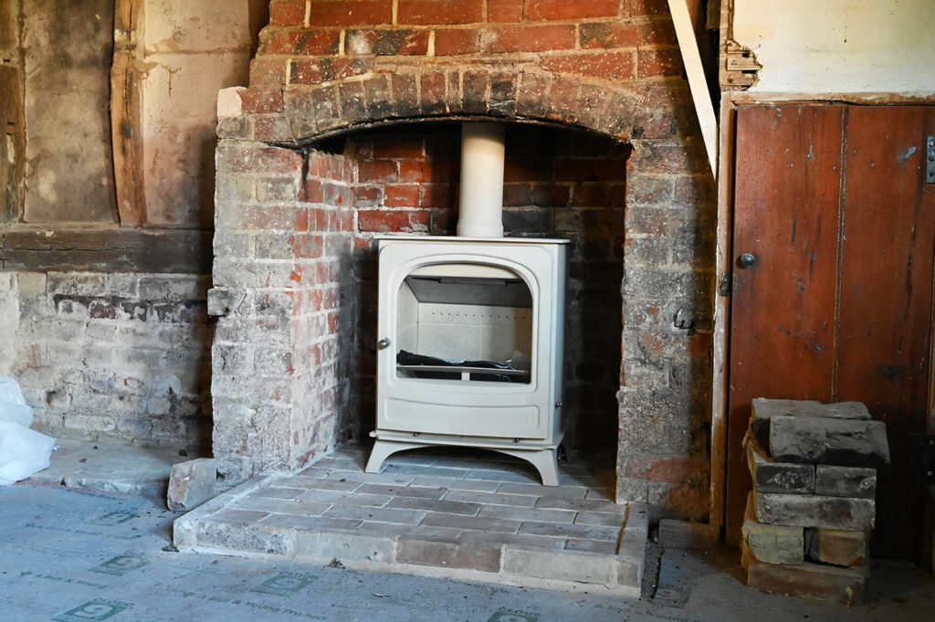 Saving energy with wood burners, wayne mills, suffolk builder